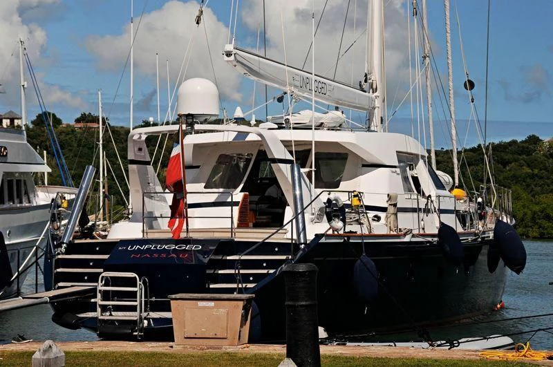 a boat on a dock aboard UNPLUGGED Yacht for Sale