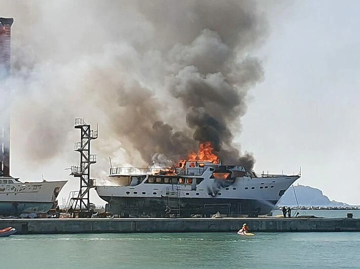 a large ship on fire aboard HIDALGO Yacht for Sale