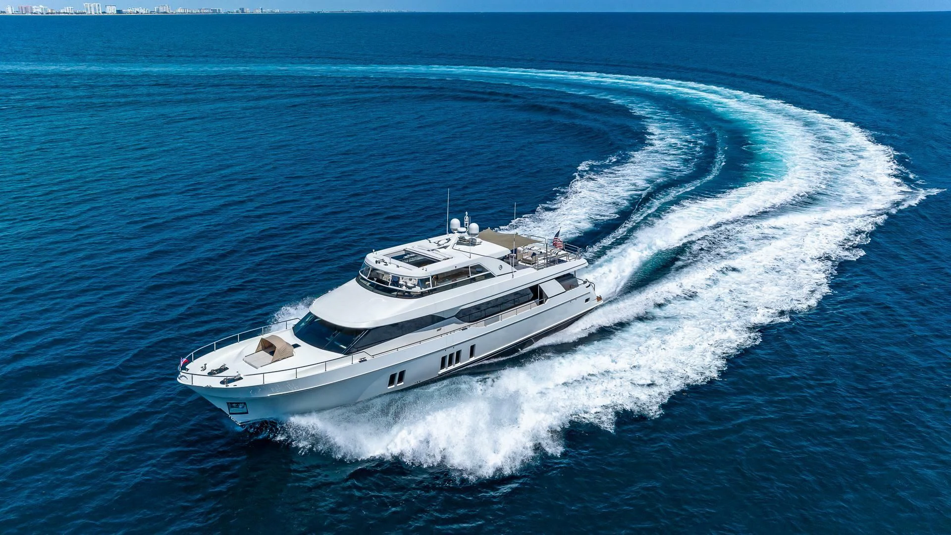 a white yacht on the water aboard BRAVO ZULU II Yacht for Sale