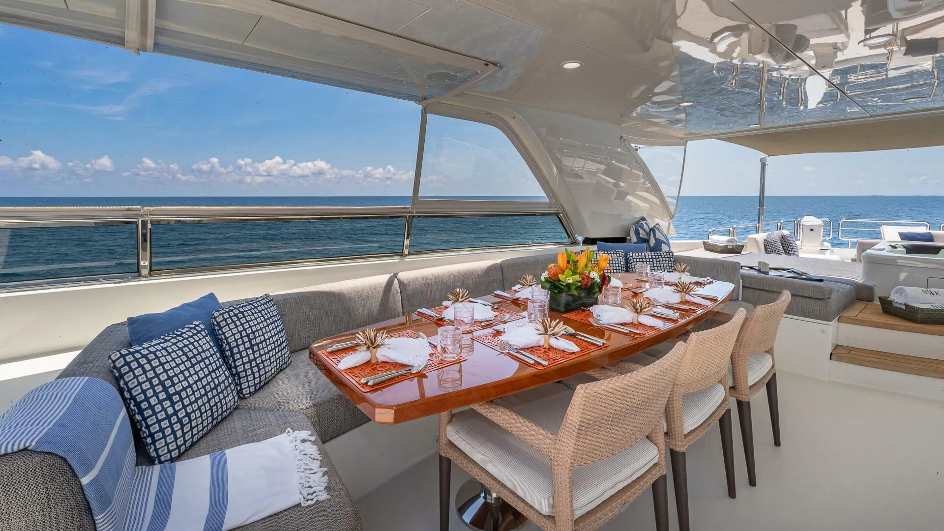 a table set for a meal aboard BRAVO ZULU II Yacht for Sale