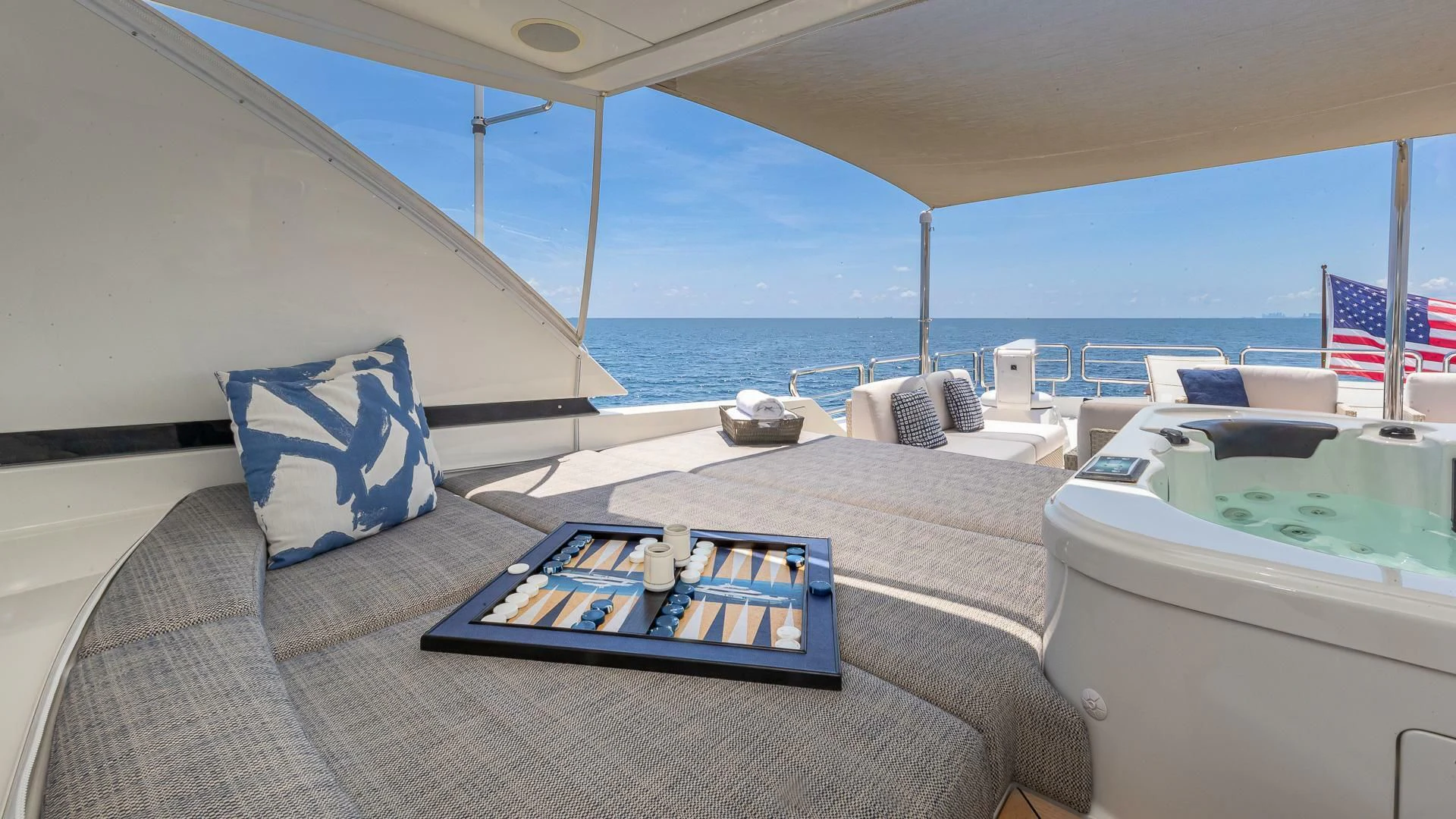 a bed with a rug on it aboard BRAVO ZULU II Yacht for Sale