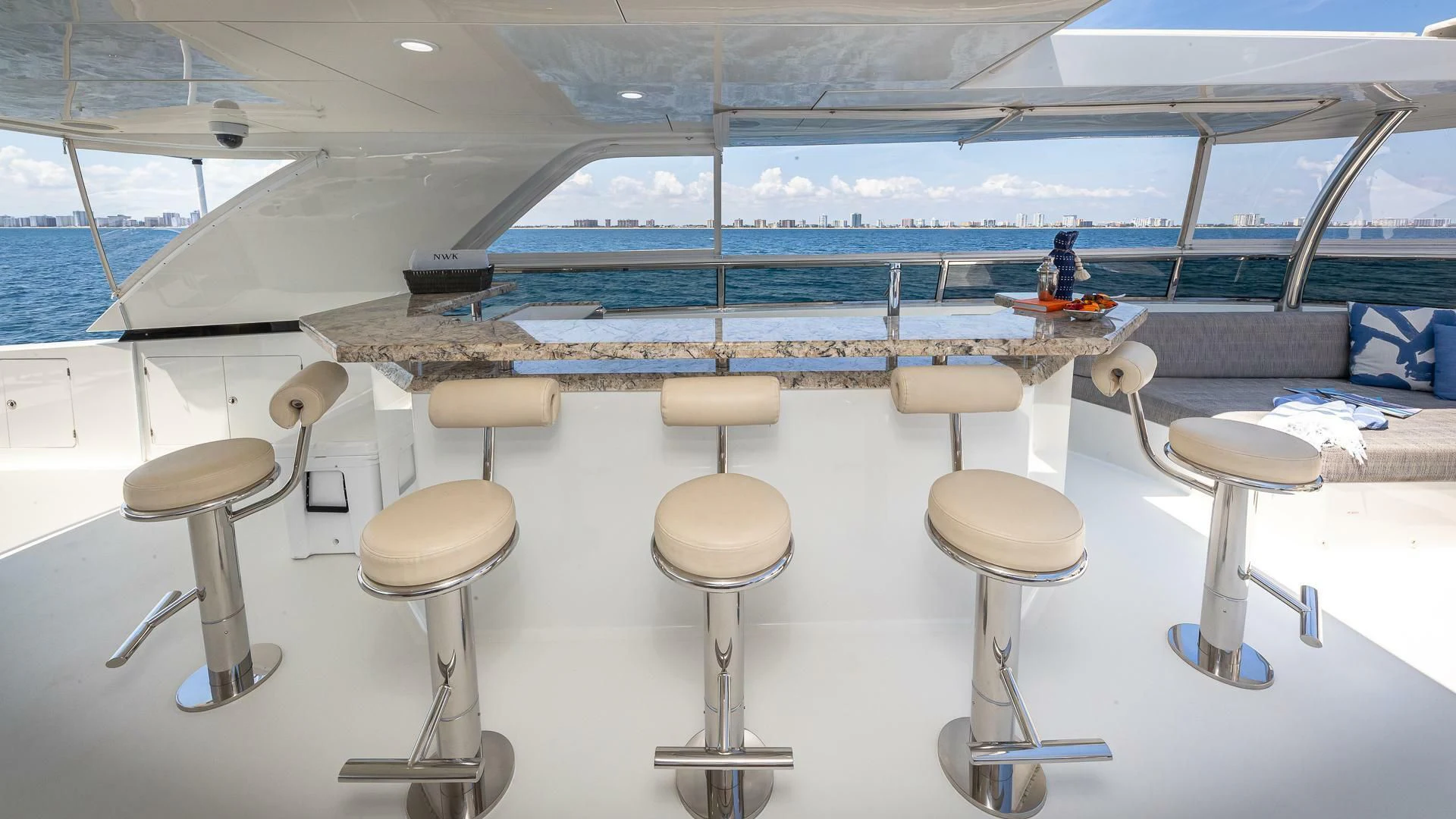 a boat with stools and stools on it aboard BRAVO ZULU II Yacht for Sale