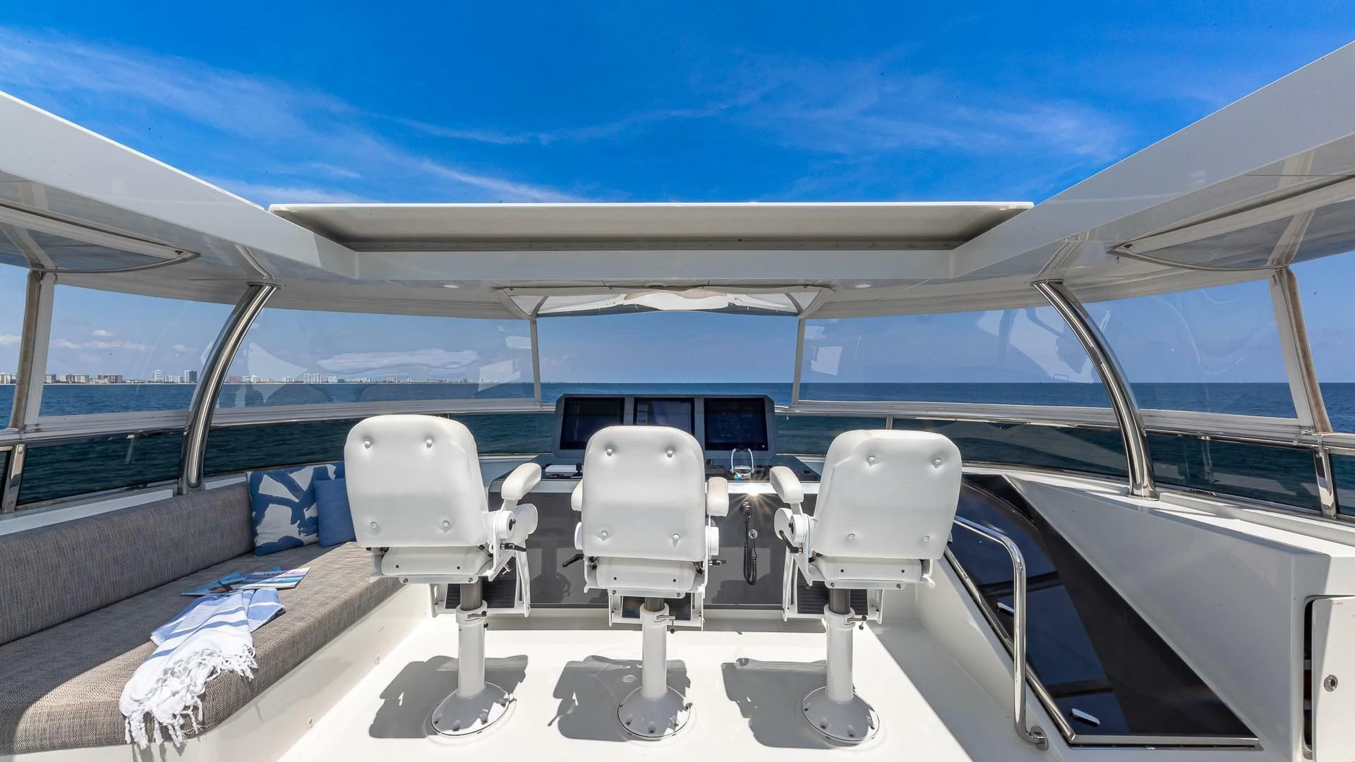 a boat with chairs on it aboard BRAVO ZULU II Yacht for Sale