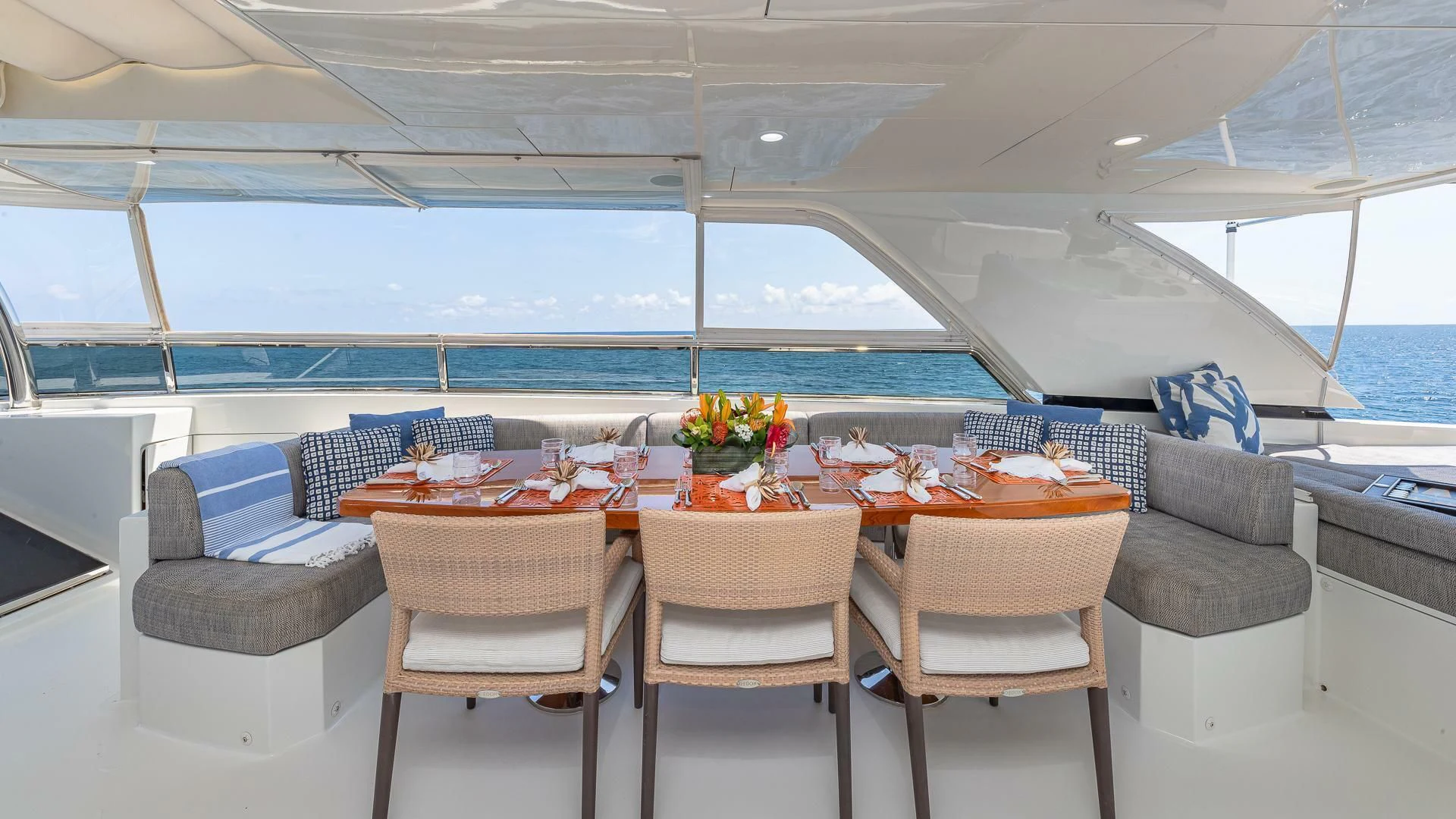 a table set for a meal aboard BRAVO ZULU II Yacht for Sale