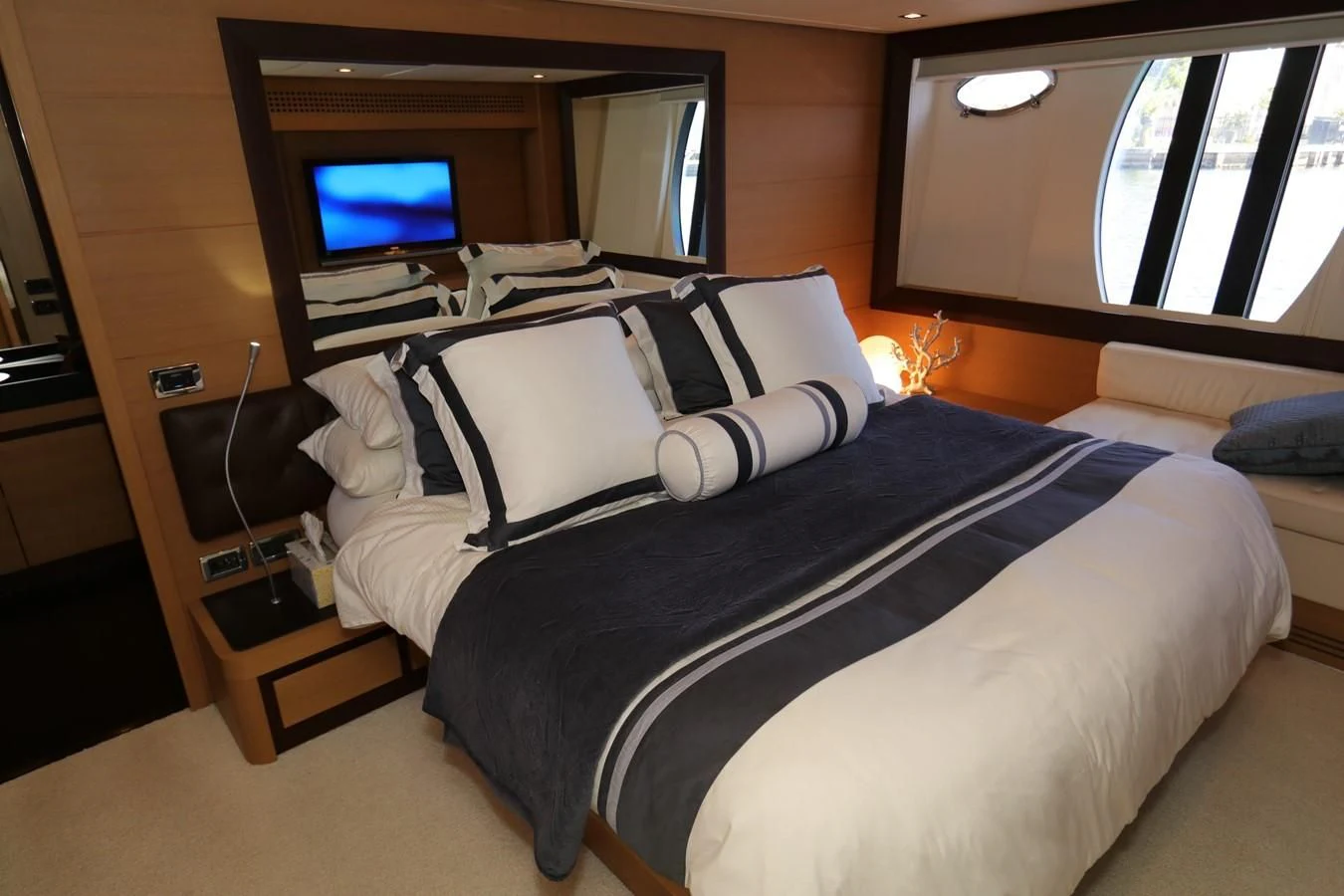 a bed with pillows and pillows aboard VANTAGE Yacht for Charter