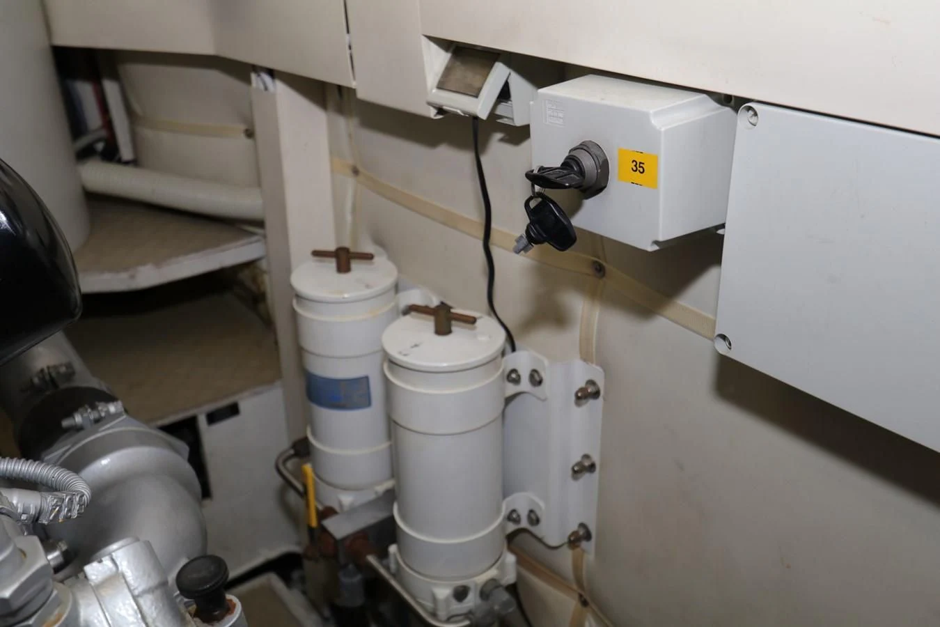 a machine with pipes aboard VANTAGE Yacht for Charter