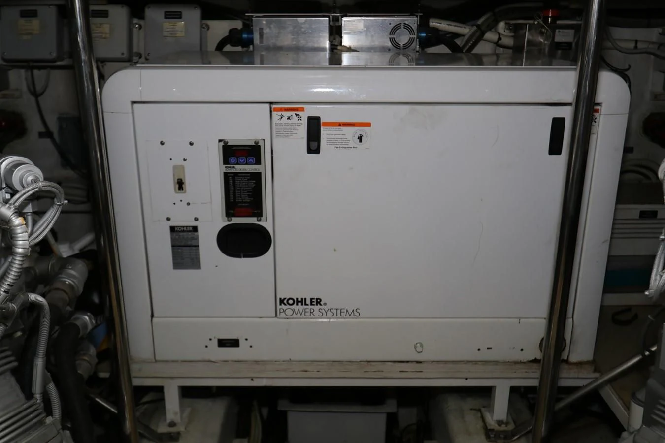 a white rectangular machine aboard VANTAGE Yacht for Charter