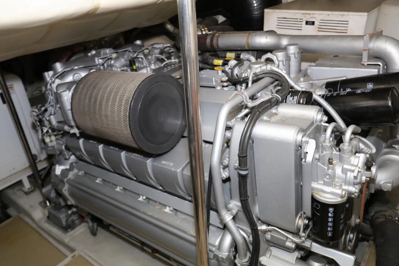 a close-up of a car engine aboard VANTAGE Yacht for Charter