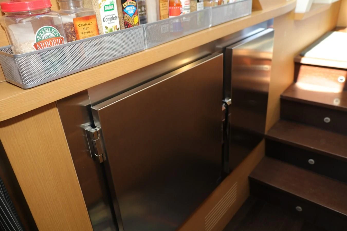 a refrigerator with a lot of food on it aboard VANTAGE Yacht for Charter