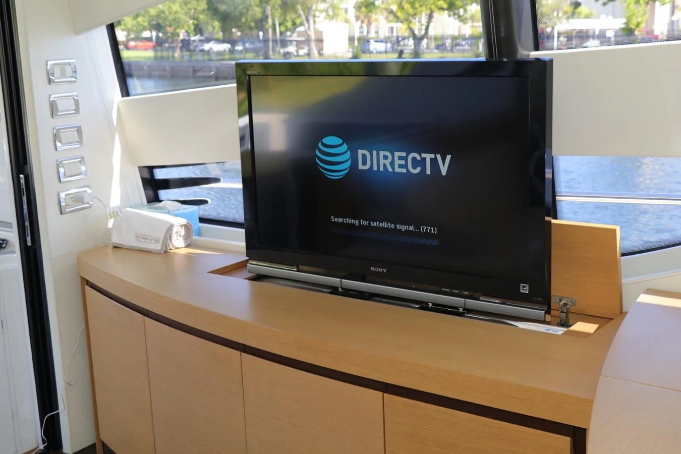 a computer on a desk aboard VANTAGE Yacht for Charter