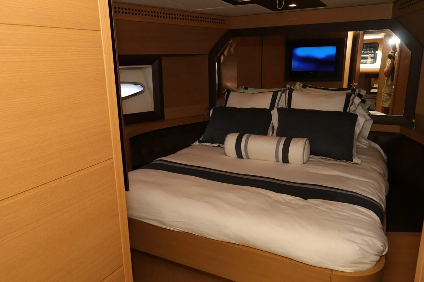 a bed with pillows aboard VANTAGE Yacht for Charter