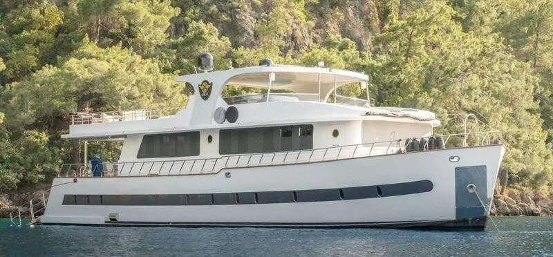 a white yacht on water aboard SIMAY S Yacht for Sale