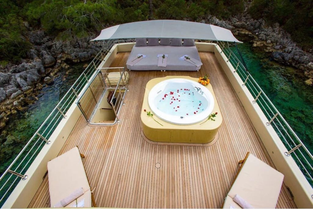 a swimming pool on a deck aboard SIMAY S Yacht for Sale
