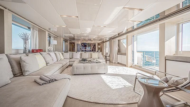 a living room with a large window aboard RUSCELLO Yacht for Sale