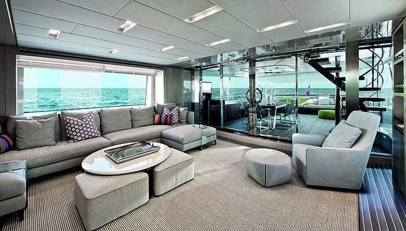 a living room with a large glass wall aboard RUSCELLO Yacht for Sale