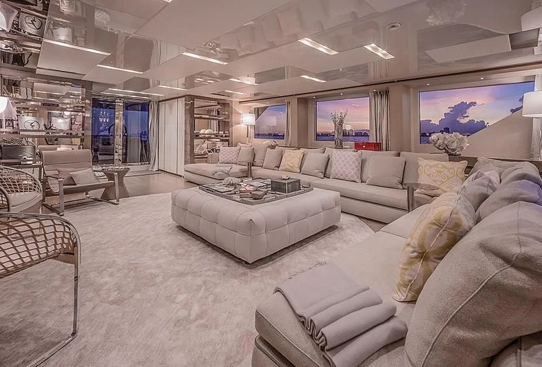a living room with a couch and a tv aboard RUSCELLO Yacht for Sale
