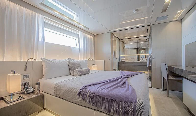 a bed in a room aboard RUSCELLO Yacht for Sale
