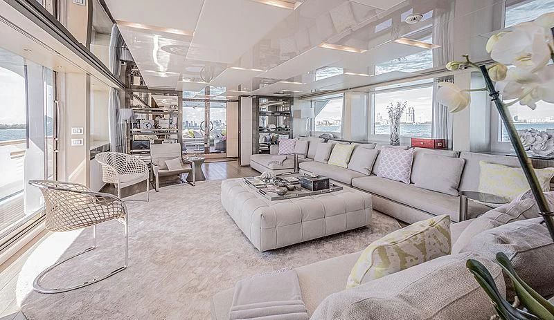 a living room with a large window aboard RUSCELLO Yacht for Sale