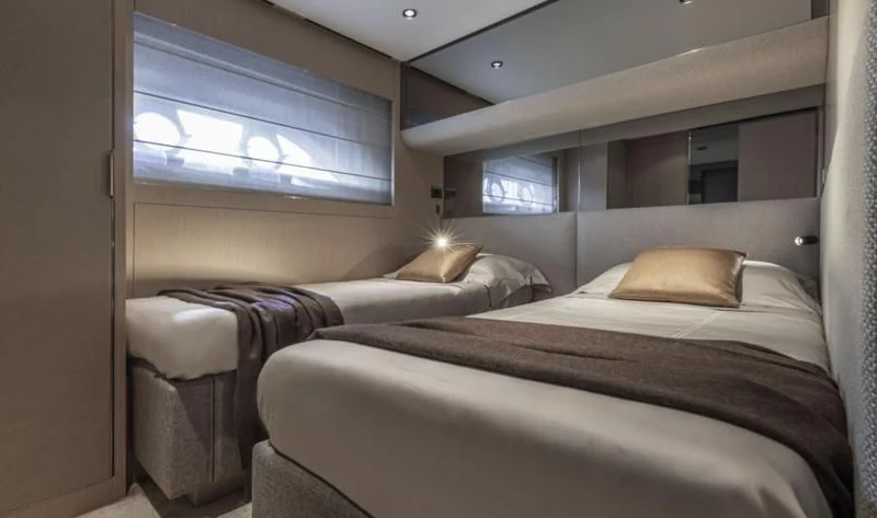 a room with two beds aboard FERRETTI 780/41 Yacht for Sale