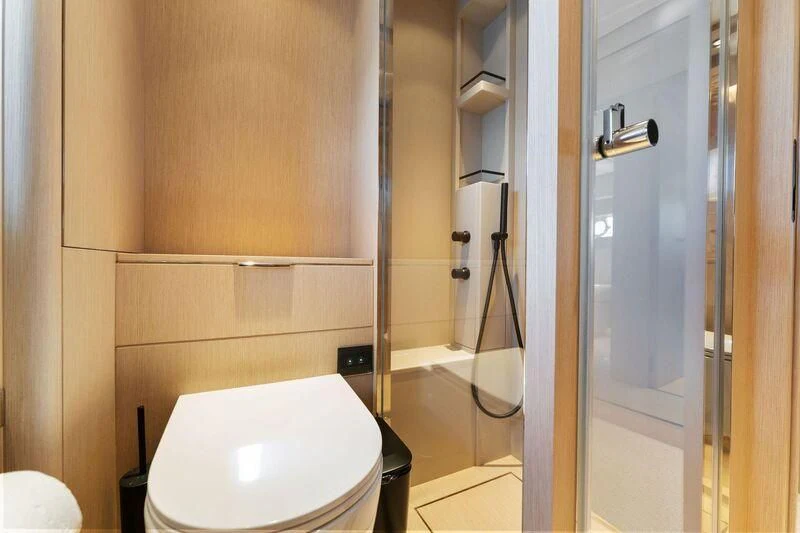 a bathroom with a toilet and a shower aboard FERRETTI 780/41 Yacht for Sale