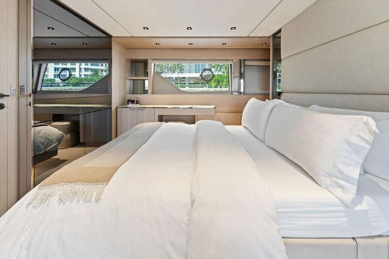 a bed with white sheets aboard FERRETTI 780/41 Yacht for Sale