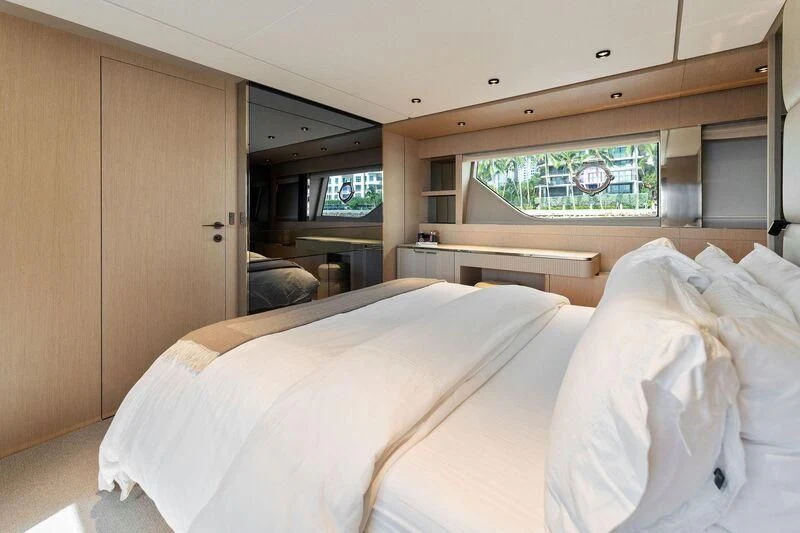 a room with a bed and a television aboard FERRETTI 780/41 Yacht for Sale