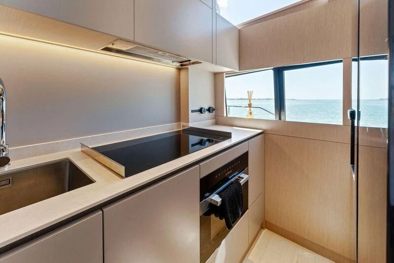 a kitchen with a sink and a window aboard FERRETTI 780/41 Yacht for Sale