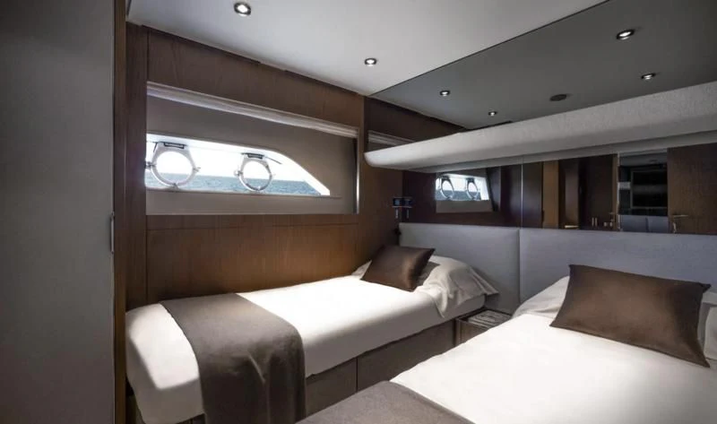 a room with two beds aboard FERRETTI 780/41 Yacht for Sale
