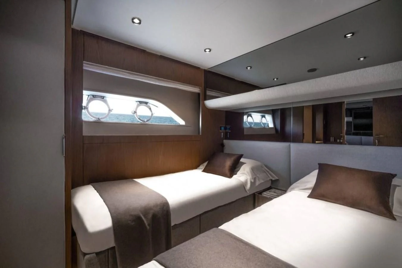 a room with two beds aboard FERRETTI 780/41 Yacht for Sale