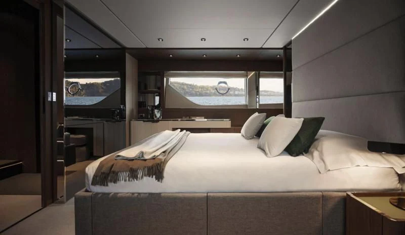 a room with a bed and a window aboard FERRETTI 780/41 Yacht for Sale