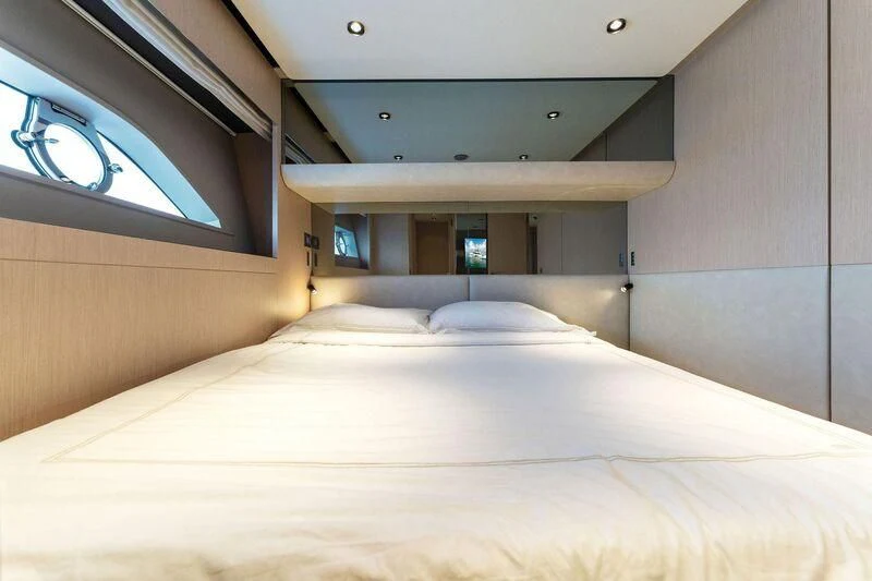 a bed with white sheets aboard FERRETTI 780/41 Yacht for Sale