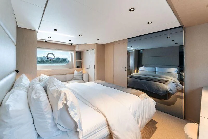 a room with a bed and a mirror aboard FERRETTI 780/41 Yacht for Sale
