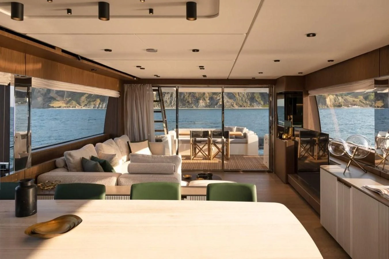 a living room with a large window aboard FERRETTI 780/41 Yacht for Sale