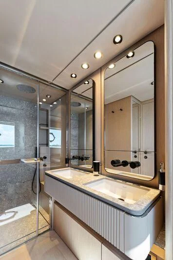 a bathroom with a large mirror aboard FERRETTI 780/41 Yacht for Sale