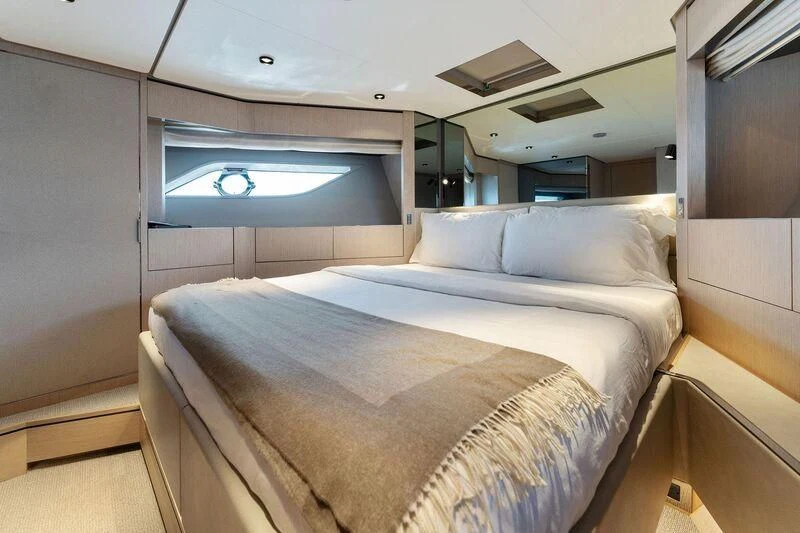 a bed in a room aboard FERRETTI 780/41 Yacht for Sale