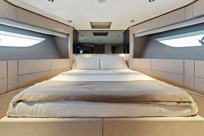 a bed with white sheets aboard FERRETTI 780/41 Yacht for Sale