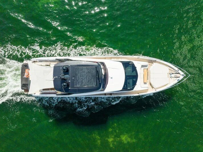 a car on a hill aboard FERRETTI 780/41 Yacht for Sale