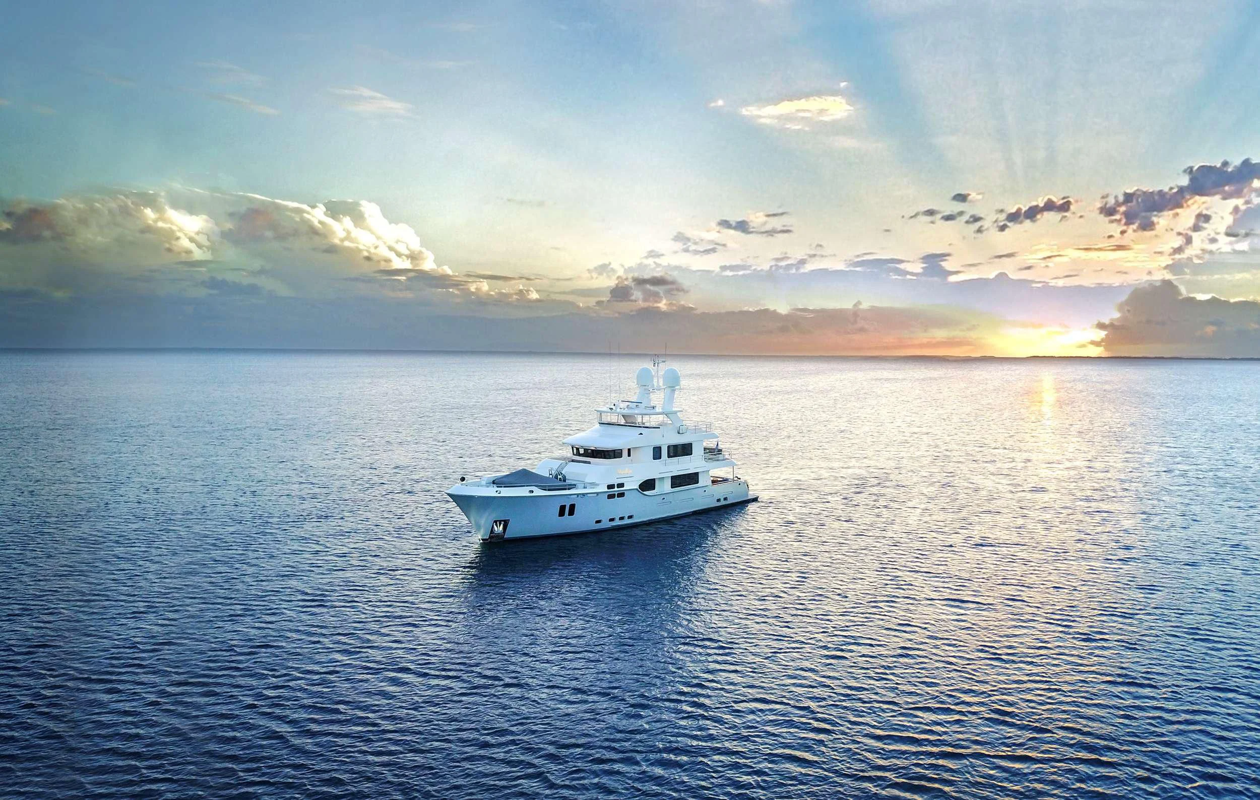 a white boat in the water aboard VIVIERAE II Yacht for Sale