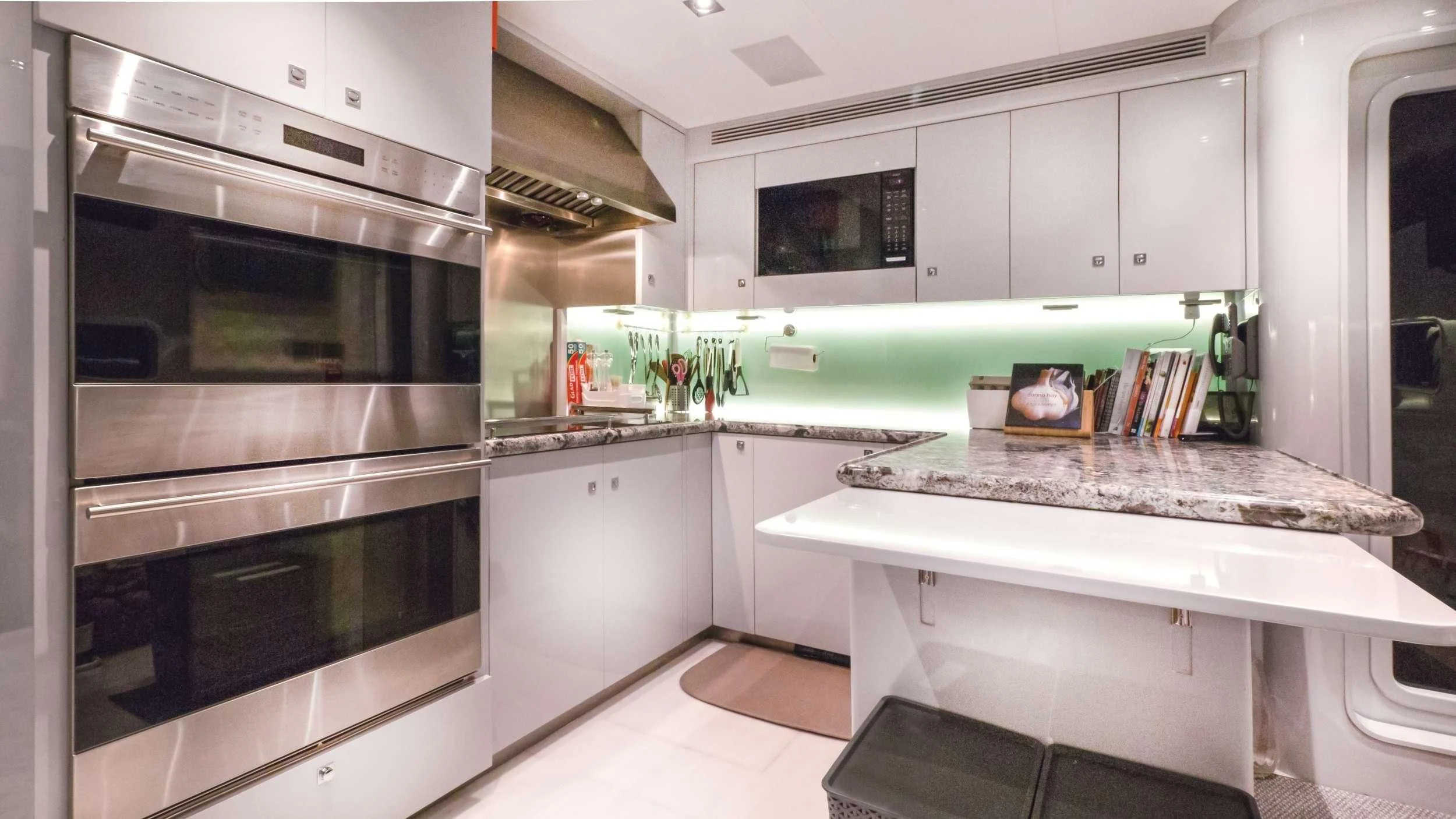 a kitchen with a large oven aboard VIVIERAE II Yacht for Sale