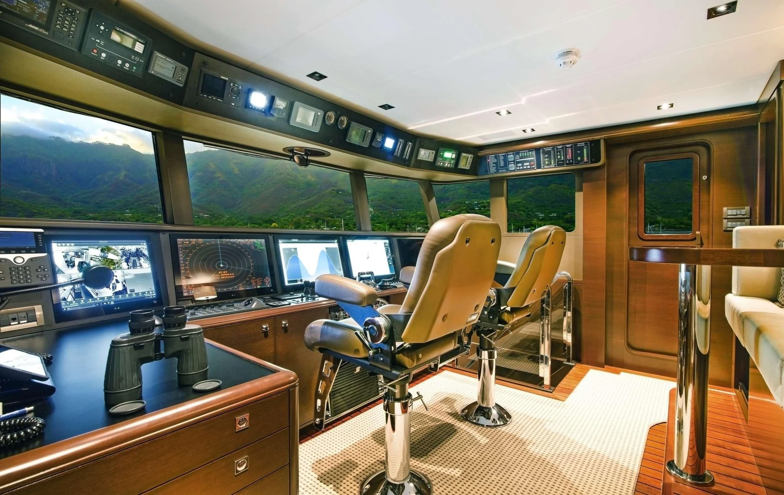 a room with a table and chairs aboard VIVIERAE II Yacht for Sale