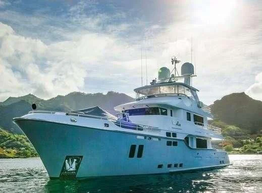 a large boat on the water aboard VIVIERAE II Yacht for Sale
