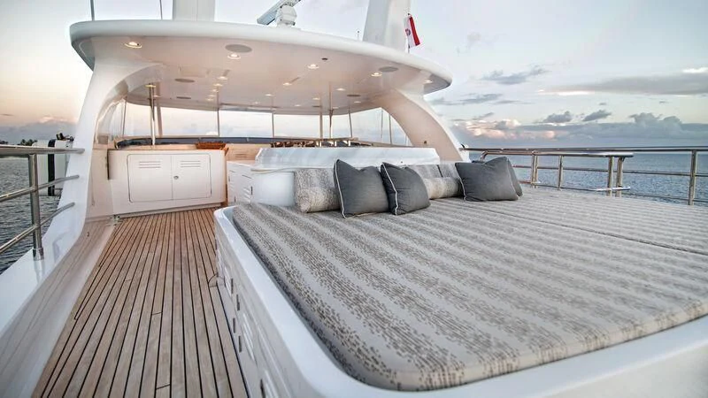 a bed on a deck aboard VIVIERAE II Yacht for Sale