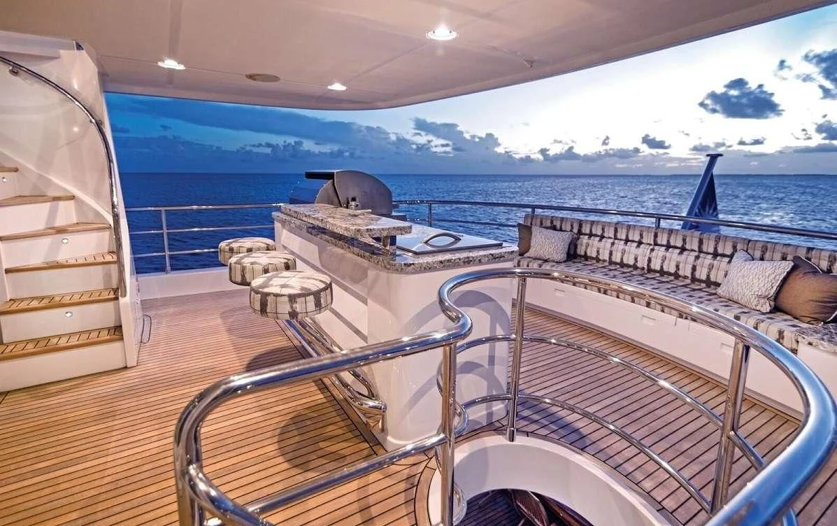 a deck with a view of the ocean and the ocean aboard VIVIERAE II Yacht for Sale