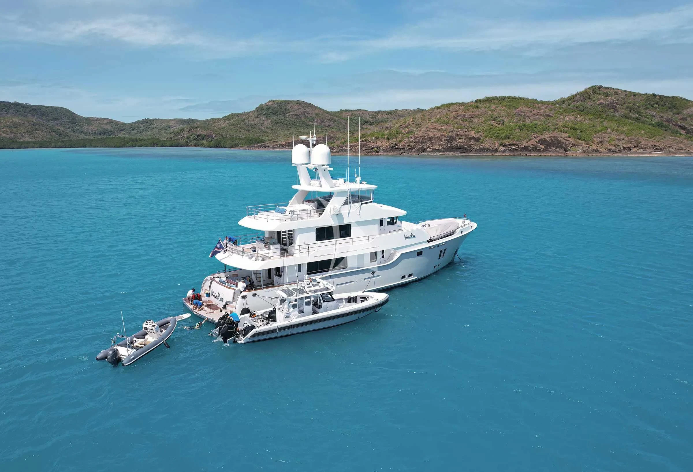 a boat with a helicopter on it aboard VIVIERAE II Yacht for Sale