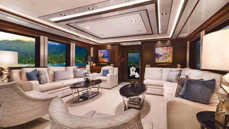 a living room with a large window aboard VIVIERAE II Yacht for Sale