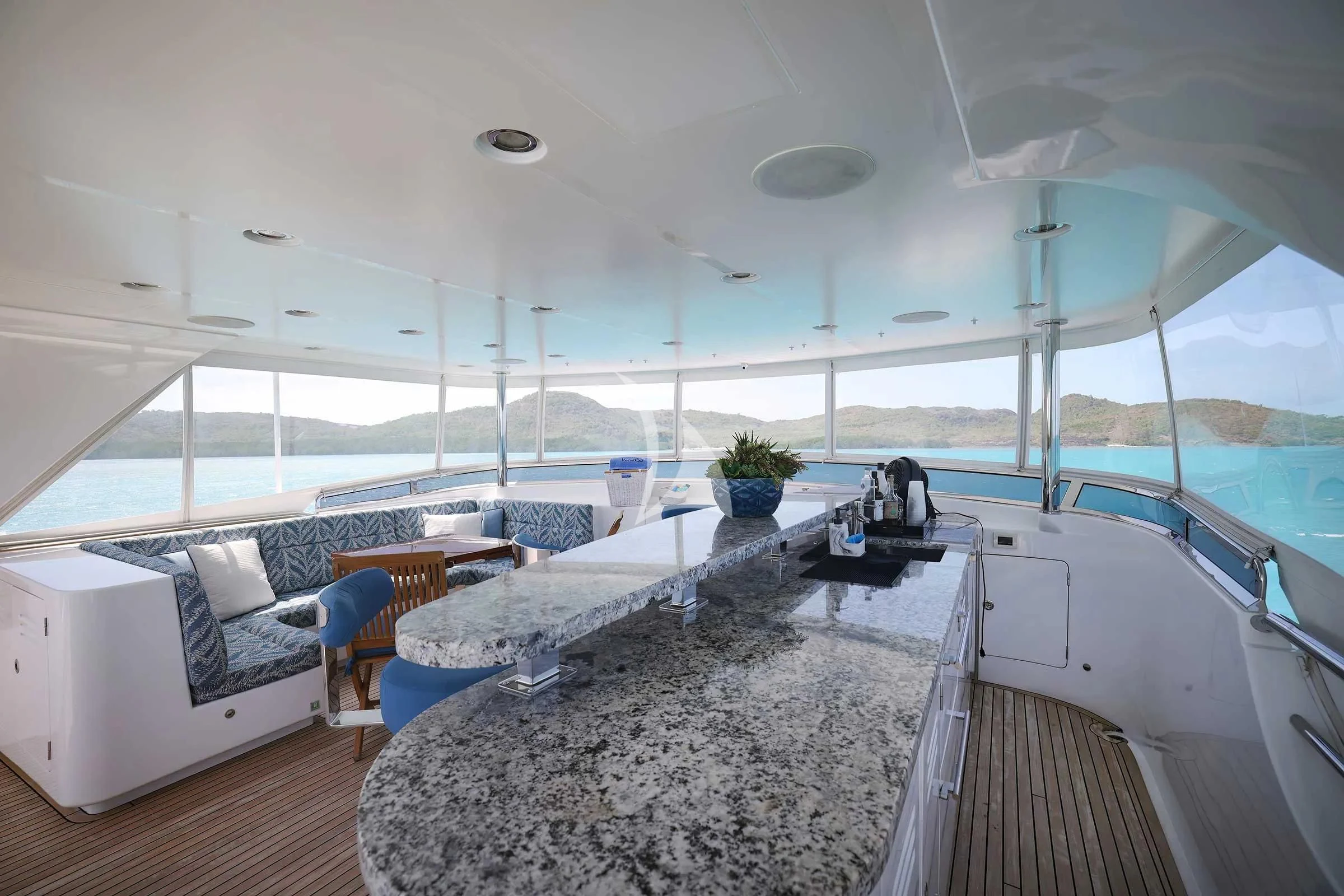 a large living room with a large glass window aboard VIVIERAE II Yacht for Sale
