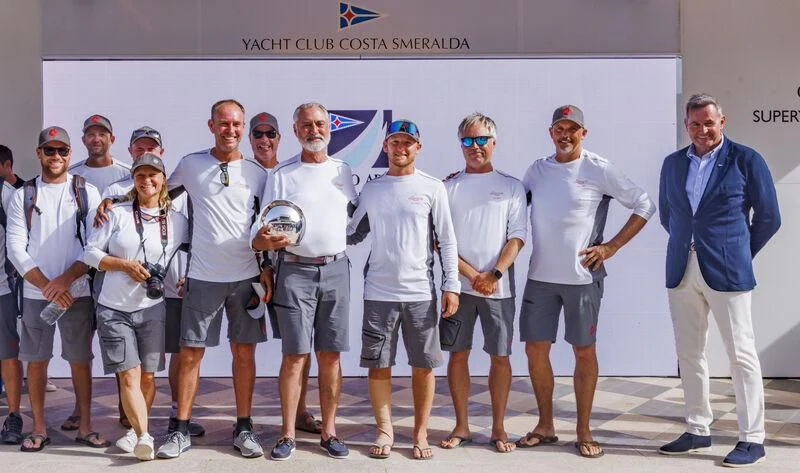a group of men posing for a photo aboard ALLEGRA Yacht for Sale
