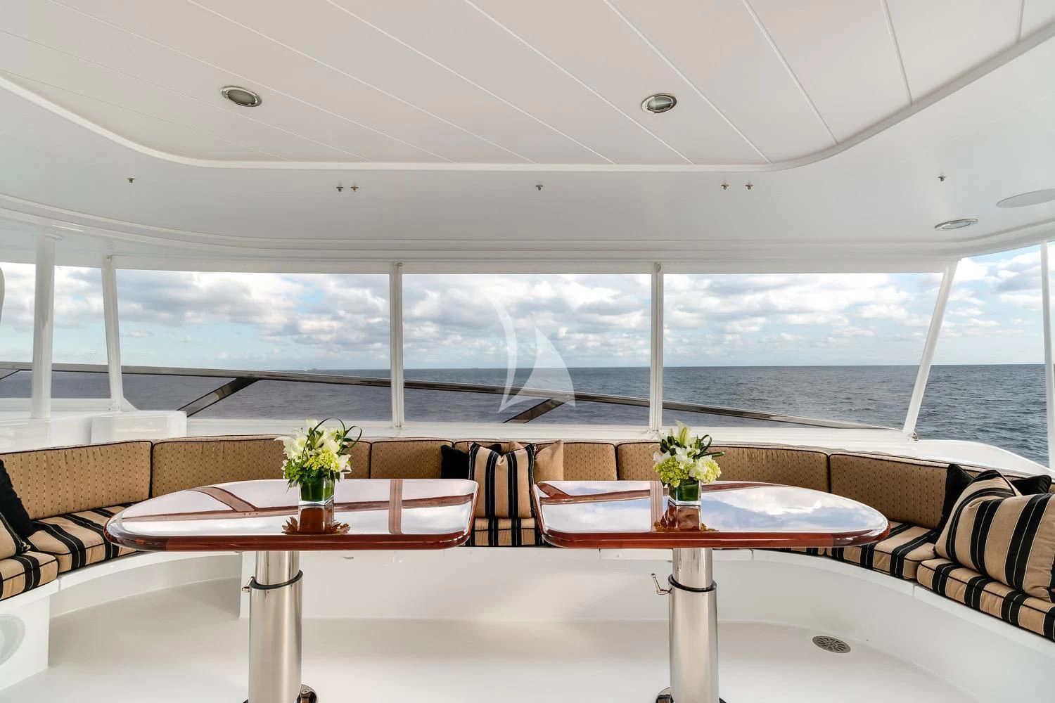 a room with a table and chairs aboard MY WAY Yacht for Sale