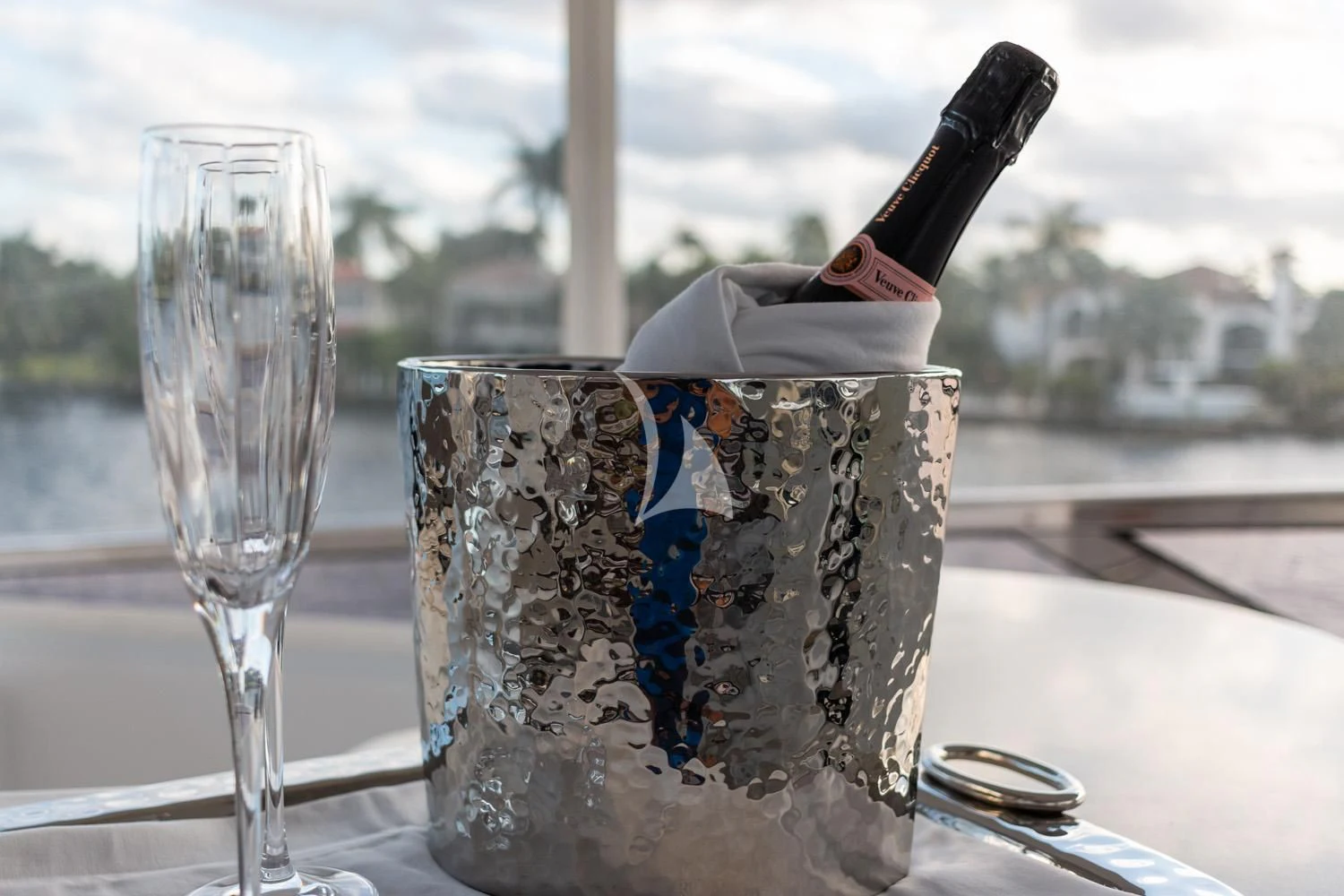 a bottle of champagne and a glass aboard MY WAY Yacht for Sale