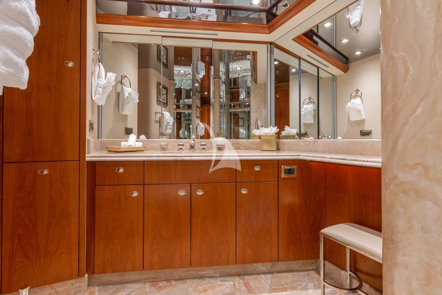 a bathroom with wooden cabinets aboard MY WAY Yacht for Sale